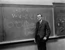 Dirac devant les équations montrant l'existence de l'antimatière